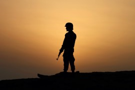 A Pakistan Navy soldier stands guard at a hilltop position near Gwadar port, about 700 kilometers (435 miles) west of Karachi. Pakistan [AP]