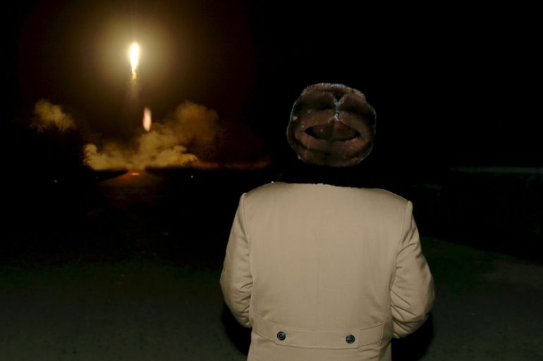 KCNA file picture shows North Korean leader Kim Jong Un watching the ballistic rocket launch drill of the Strategic Force of the Korean People''s Army at an unknown location