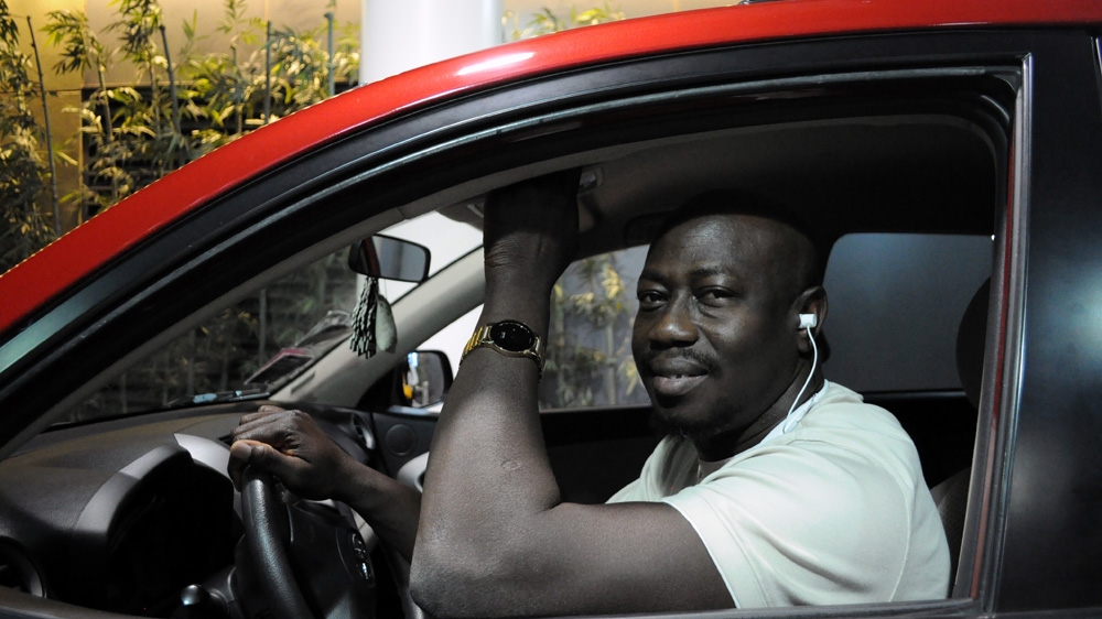 Ibrahima Conde, 40, who relocated to Las Vegas in 2012 and first worked in casino-hotels before becoming a driver for hire through e-hailing service, Lyft  [Joe Jackson/Al Jazeera]