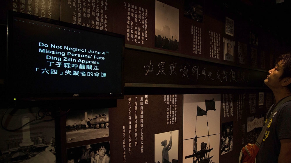 A display of images showing the events leading up to the massacre is on view at the musuem on its opening day, April 26, 2014 [Lam Yik Fei/Getty Images]