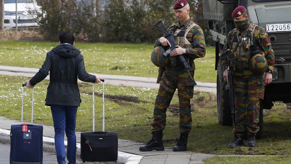 Belgian soldiers control the access to the airport [Reuters]