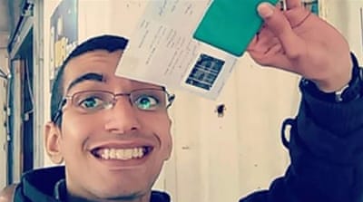 Majd posted a selfie to Facebook, in which he held up his Israeli-issued entry permit [Facebook]