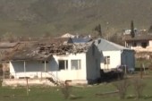 A house which was damaged during clashes between Armenian and Azeri forces is seen in Nagorno-Karabakh region. [Reuters]