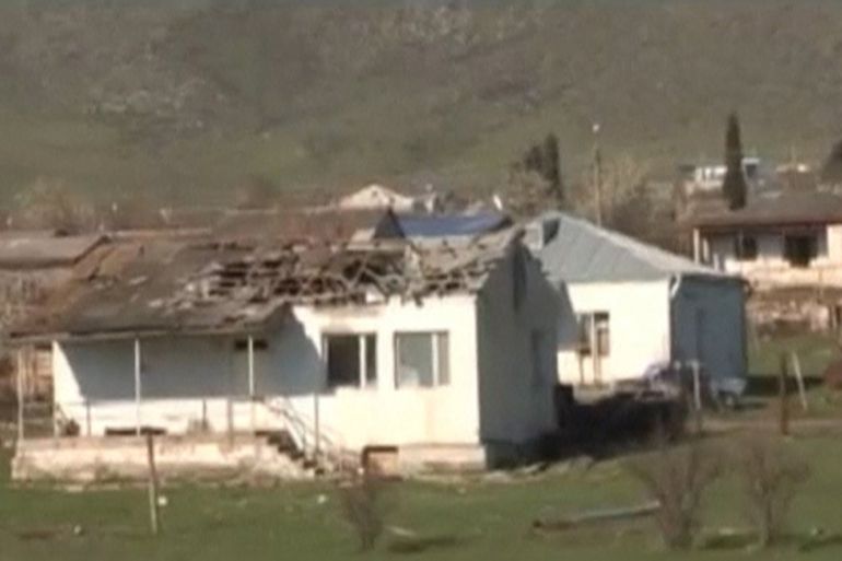 A house which was damaged during clashes between Armenian and Azeri forces is seen in Nagorno-Karabakh region [REUTERS]