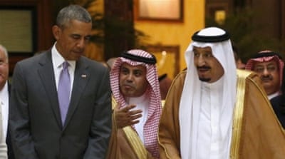 US President Barack Obama and Saudi King Salman walk together following their meeting in Riyadh, Saudi Arabia [Reuters]
