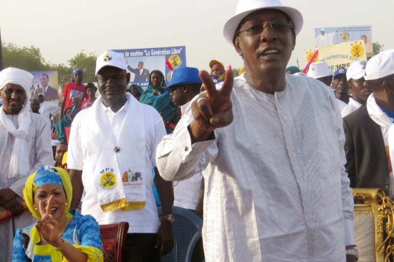 Chadian President Idriss Deby gestures during a campaign rally in Ndjamena