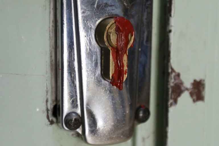Wax covers the keyhole at the main entrance of the Muslim Brotherhood''s office in Amman