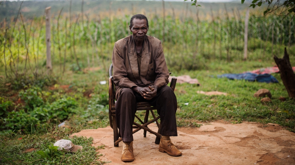 Ndiku Mutwiwa Mutua says: 'After I was castrated, I remained at home and I've been living under [the] care of my brother; he is the one who takes care of me.' They cultivate their fields for food. 'Whatever we eat, whatever we do, it depends on yourself or on support from the family. The [Kenyan] government has done nothing for freedom fighters' [Phil Moore/Al Jazeera]