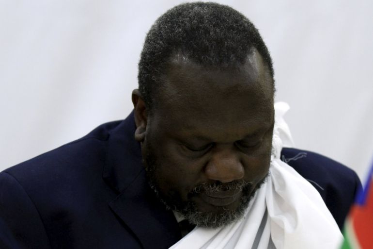 South Sudan''s opposition leader Riek Machar prays during a briefing ahead of his return to South Sudan as vice president, in Addis Ababa