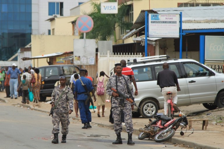 Policemen and soldiers patrol the streets after a grenade attack of Burundi''s capital Bujumbura