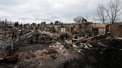 Burned out homes in the Abasand neighbourhood of Fort McMurray, Alberta, Canada [Reuters]