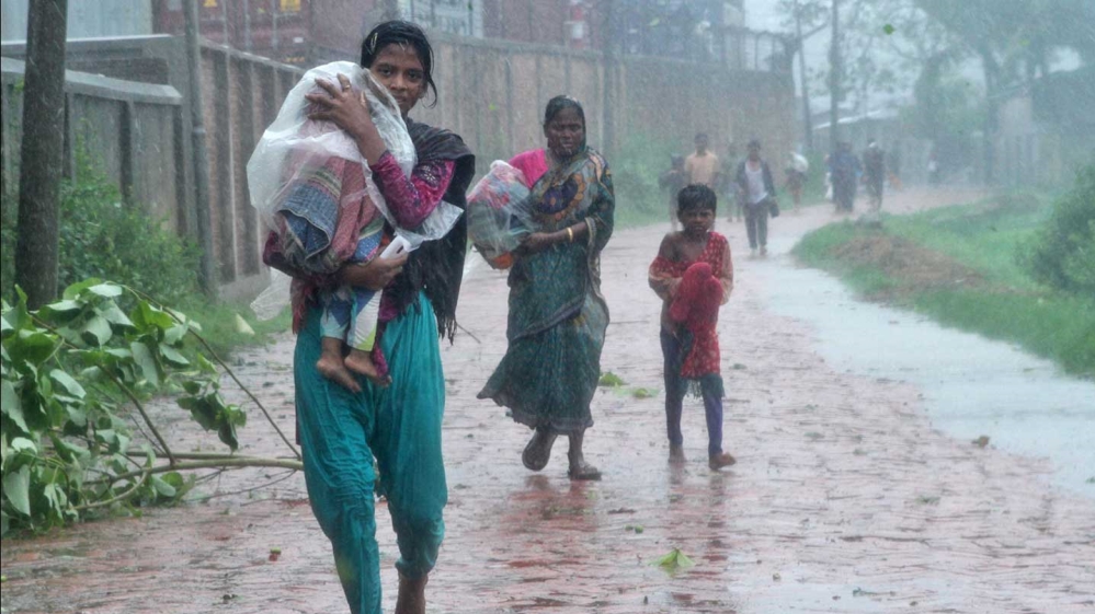 Authorities in low-lying Bangladesh took more than 500,000 people into shelters [EPA]