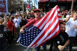 Supporters of Trump shout at anti-Trump demonstrators outside a campaign event for Republican U.S. presidential candidate Donald Trump in San Diego