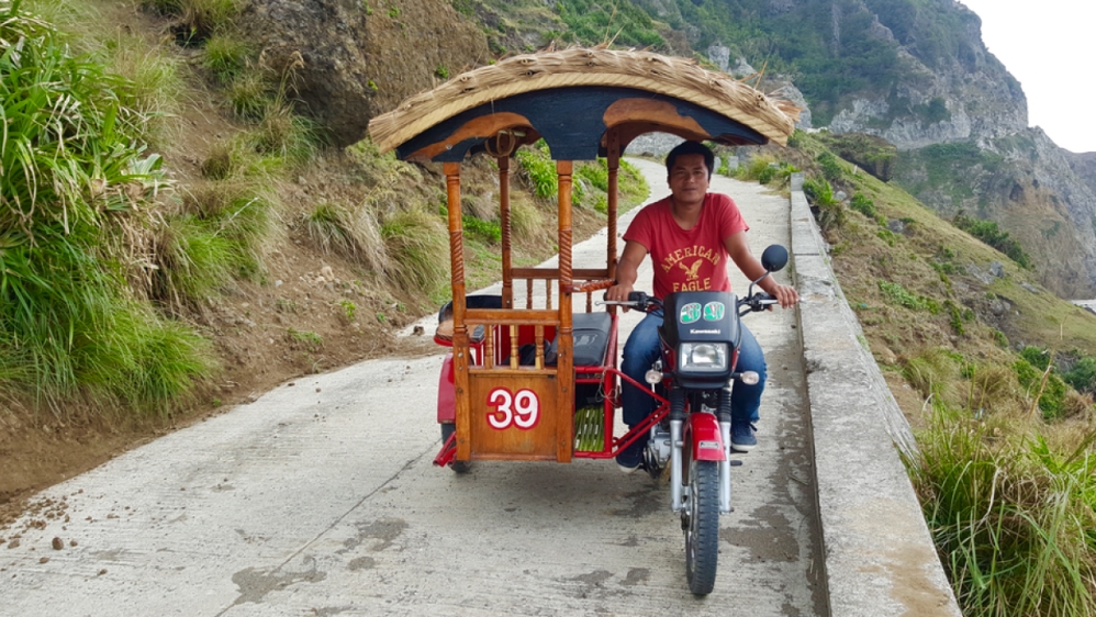 Pedro Gari earn about $17 a day transporting tourists around the island of Sabtang in Batanes [Ted Regencia/Al Jazeera]