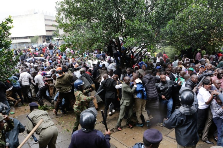 Kenya opposition leaders and supporters teargased after attempting to enter electoral commision offices by force