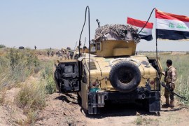 Iraqi military trucks take up position during a military operation southwest of Fallujah city [EPA]