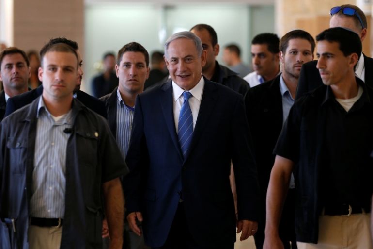 Israeli Prime Minister Benjamin Netanyahu arrives to attend his Likud party faction meeting at the Knesset in Jerusalem