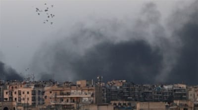 Smoke rises after air strikes on the rebel-held al-Sakhour neighbourhood of Aleppo, Syria [Reuters]