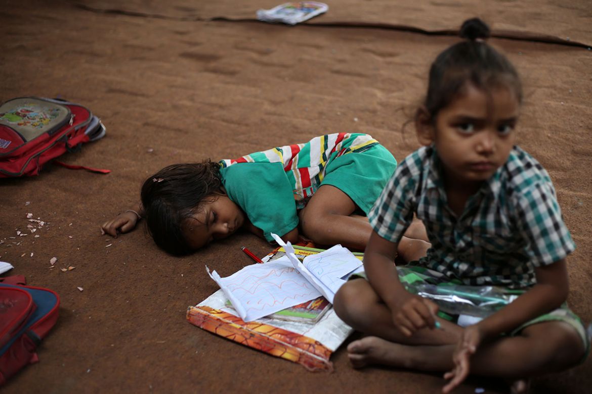 Free school under bridge for poor and needy children [Showkat Shafi/Al Jazeera]