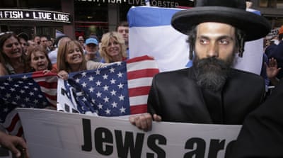 Pro-Israel protesters attend a rally near Times Square to demand that Congress vote down the proposed US deal with Iran in New York, in July 2015 [EPA]
