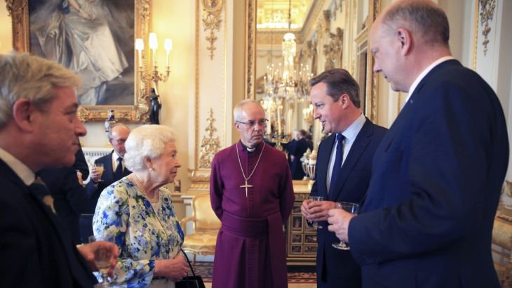 Britain''s Prime Minister David Cameron speaks with Queen Elizabeth