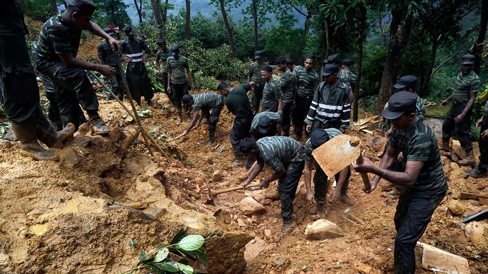 About 220 families were reported missing after Wednesday's landslides [EPA]