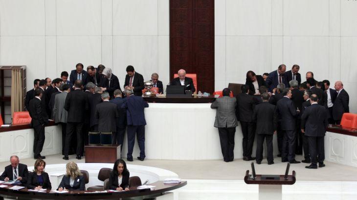 Lawmakers watch the counting of votes for an article of constitutional change that could see pro-Kurdish and other lawmakers prosecuted, at the Turkish parliament in Ankara