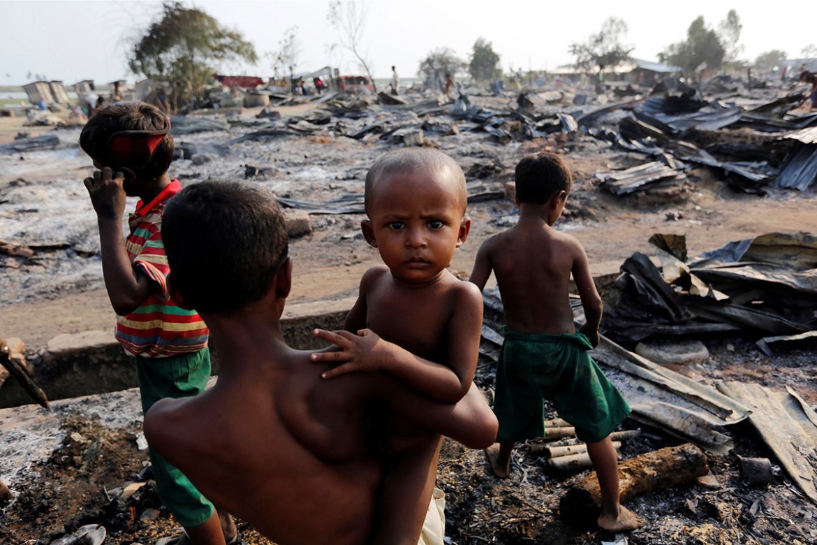 Fire destroyed shelters at a camp for internally displaced Rohingya Muslims