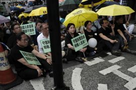 Protesters gather outside the Ming Pao''s office building during a rally in Hong Kong Monday, May 2, 2016. Around 400 people gathered Monday in Hong Kong to p