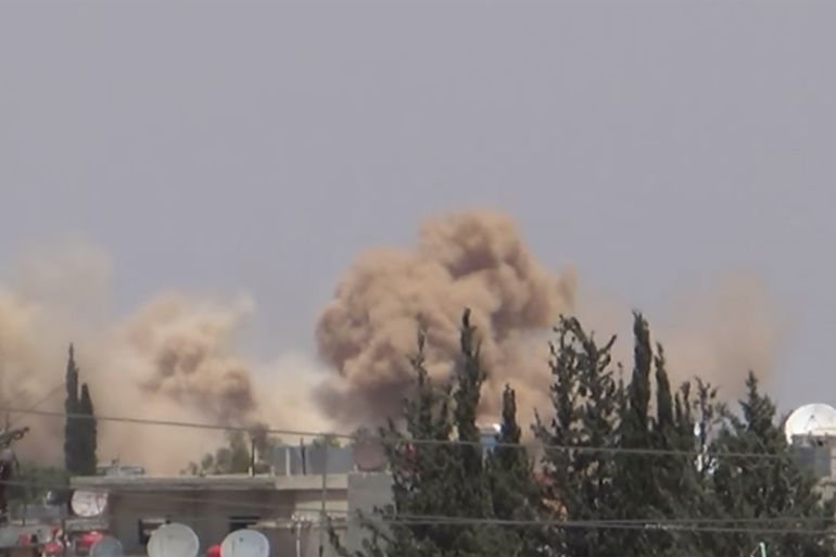 Khan Eshieh being hit by barrel bombs