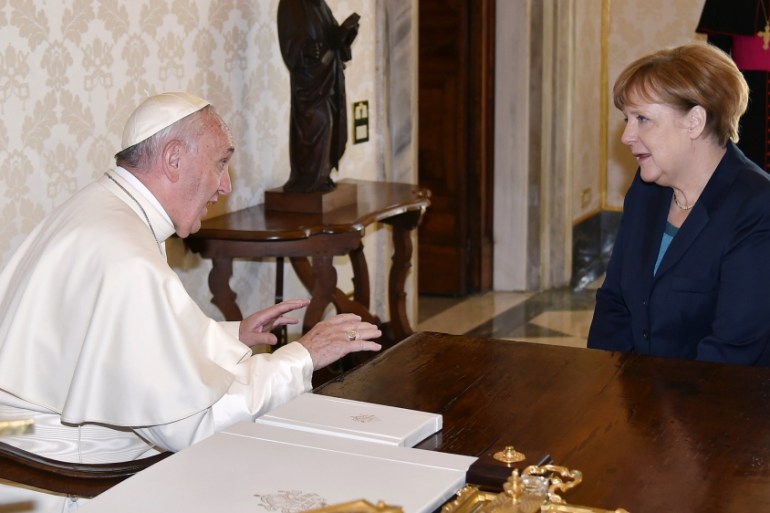 German Chancellor Merkel talks with Pope Francis during a private audience before the 2016 Charlemagne Prize ceremony, at the Vatican