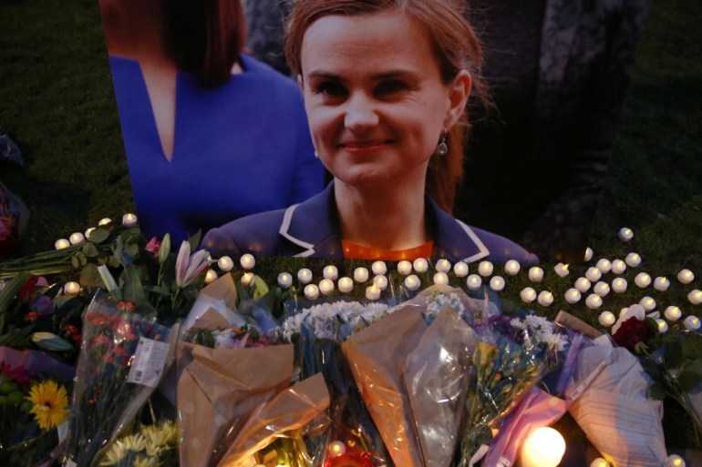 Tributes for murdered Labour Party MP Jo Cox are displayed on Parliament Square in London