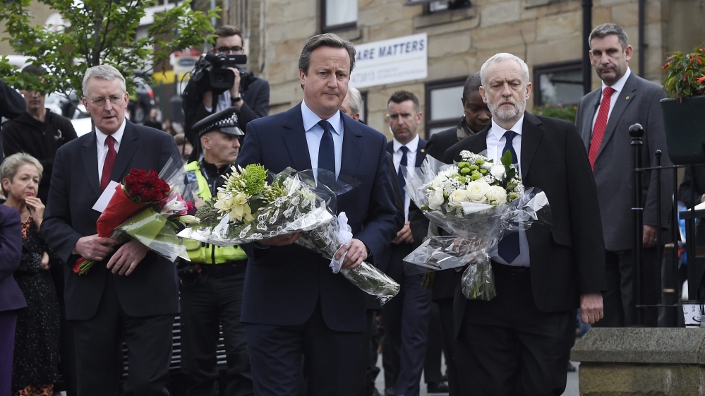 Cameron and Corbyn came together to pay respects to Cox [Facundo Arrizabalaga/EPA] 