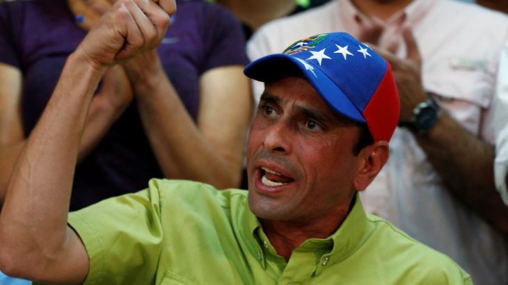 Venezuelan opposition leader and Governor of Miranda state Henrique Capriles speaks during a news conference in Caracas
