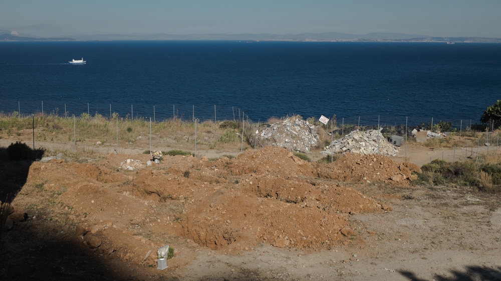 A small corner of a local cemetery is home to several graves for refugees [Nick Paleologos/SOOC/Al Jazeera]