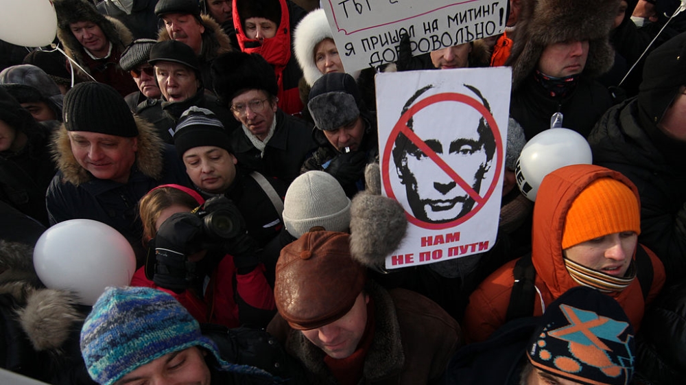 In 2012, opposition activists turned out in temperatures as low as -20C to protest against a third Putin presidency before elections. Many HIV activists and independent experts say Russia's HIV crisis has been  fuelled by the Kremlin's abandonment of internationally accepted prevention methods [Getty Images] 