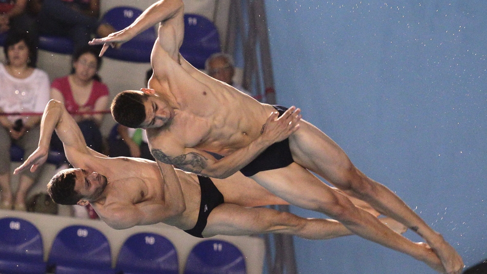 Stefanos Paparounas and Michail Nektarios Fafalis compete during the FINA International Swimming Federation diving championships in Guadalajara, Mexico [Ulises Ruiz Basurto/EPA] 