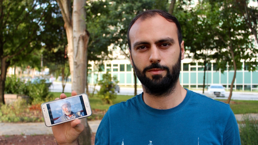 Ismail Bilgen shows a photo of his father, Ibrahim [Courtesy of Ismail Bilgen]