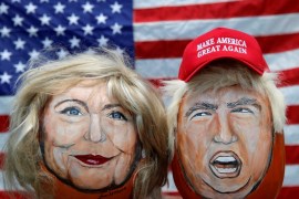 The images of US Democratic presidential candidate Hillary Clinton and Republican Presidential candidate Donald Trump are seen painted on decorative pumpkins [REUTERS]