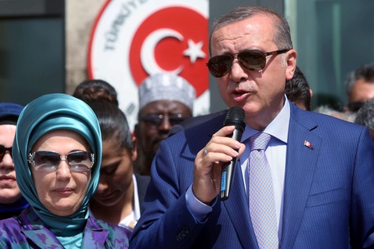 Turkish President Erdogan flanked by his wife Emine addresses guests during the opening ceremony of the new Turkish embassy in Abdiazizi district of Somalia''s capital Mogadishu