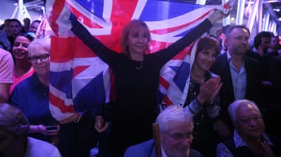 A Brexit supporter holds a Union Flag at a Vote Leave rally in London on June 4, 2016. [Reuters]