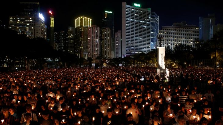 People take park in a candlelight vigil to mark the 27th anniversary of the crackdown of pro-democracy movement at Beijing''s Tiananmen Square, in Hong Kong