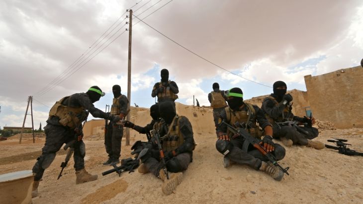 Special forces from the Syria Democratic Forces gather in Haj Hussein village, after taking control of it from Islamic State fighters, in the southern rural area of Manbij, in Aleppo Governorate