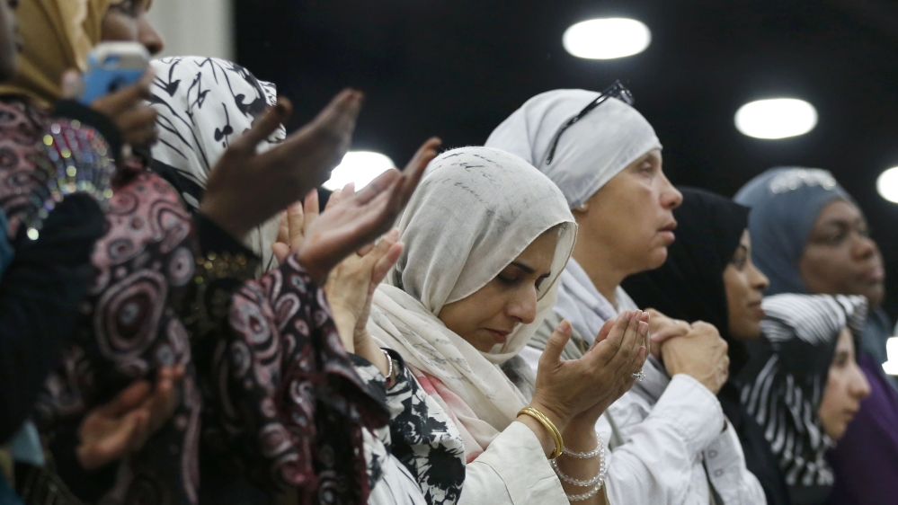 Women attend the Jenazah for the late boxing champion Muhammad Ali [Lucy Nicholson/Reuters]