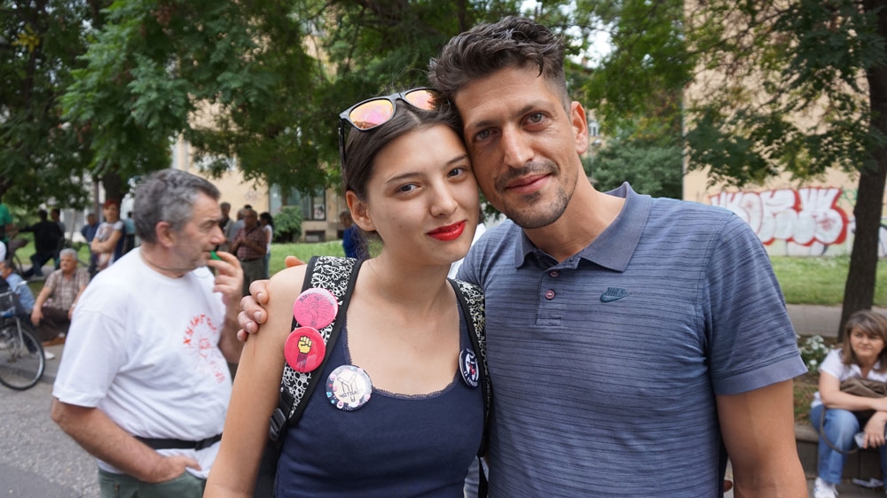 Mihaela Ivanova, 23, a law student, with fellow protester Ismail Malici, a 29-year-old human rights researcher [Patrick Strickland/Al Jazeera]