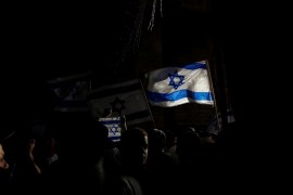 Israelis carry flags during a march marking Jerusalem Day, the anniversary of Israel''s capture of East Jerusalem during the 1967 Middle East war, inside Jerusalem''s Old City