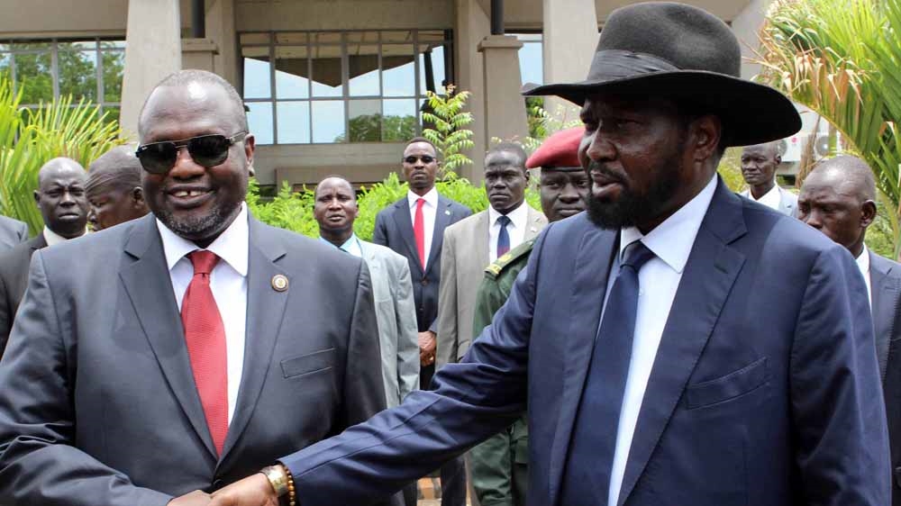 Kiir, right, says he had been friends with Machar, left, 'for many years' until 2013 [EPA]