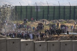 Palestinian crossing at Qalandia checkpoint to pray at Al-Aqsa Mosque