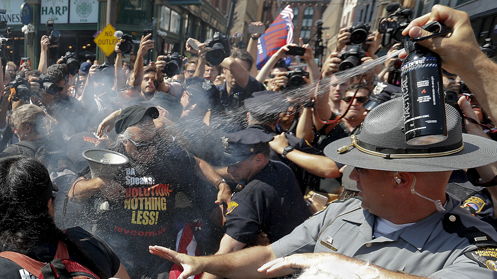 Scuffles broke out on Wednesday outside the Republican convention in Cleveland [Alex Brandon/AP]
