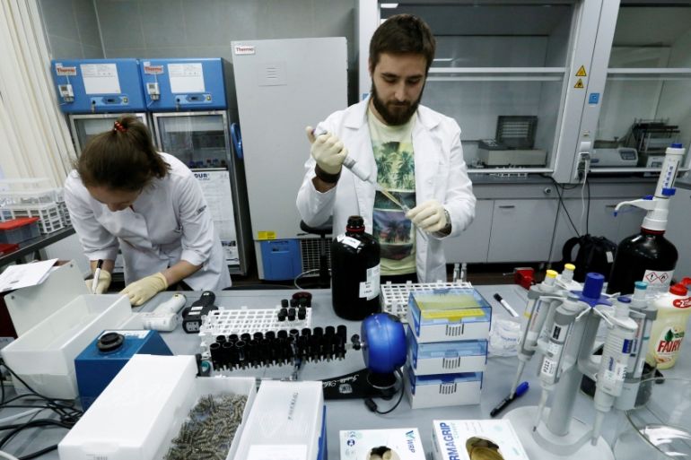 Technicians Podolsky and Bochkaryova work at Russian anti-doping laboratory in Moscow